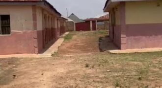 4 units of 2 bedroom flat and a bungalow of 3 bedrooms apartment on a 6 plot of land